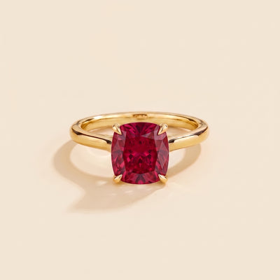 Iris Cushion Shape Ruby Cathedral Solitaire Ring in Gold