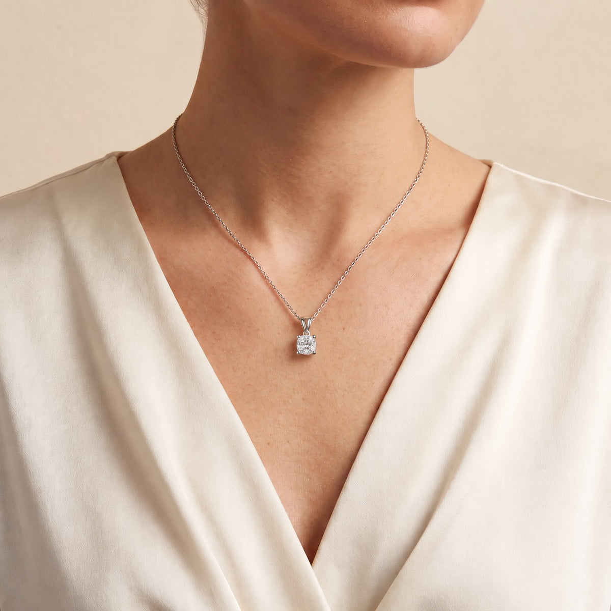 Iris cushion lab-grown diamond solitaire pendant necklace in white gold – on model | Juvetti