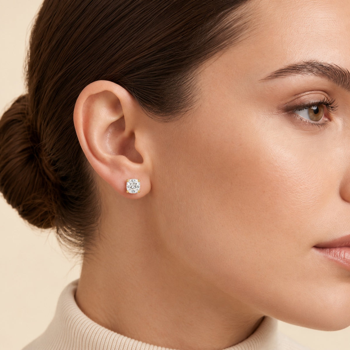 Iris cushion lab-grown diamond solitaire stud earrings in gold – on model | Juvetti
