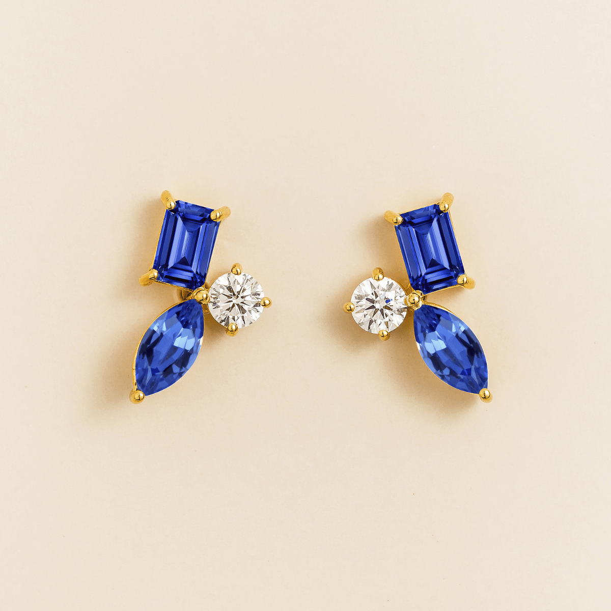 Sanka blue sapphire cluster stud earrings in gold: baguette and marquise lab-grown sapphires, round diamond