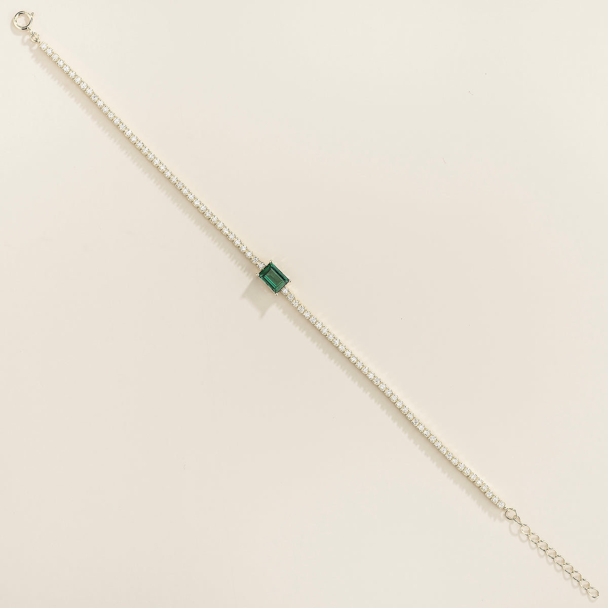Mesa emerald-cut lab-grown emerald and diamond tennis bracelet in white gold, on wrist