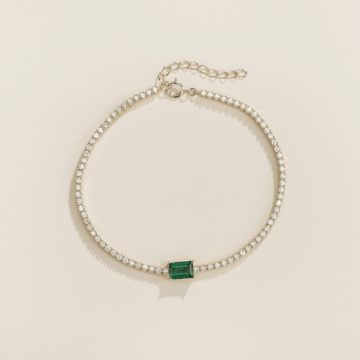 Mesa emerald-cut lab-grown emerald and diamond tennis bracelet in white gold, side view