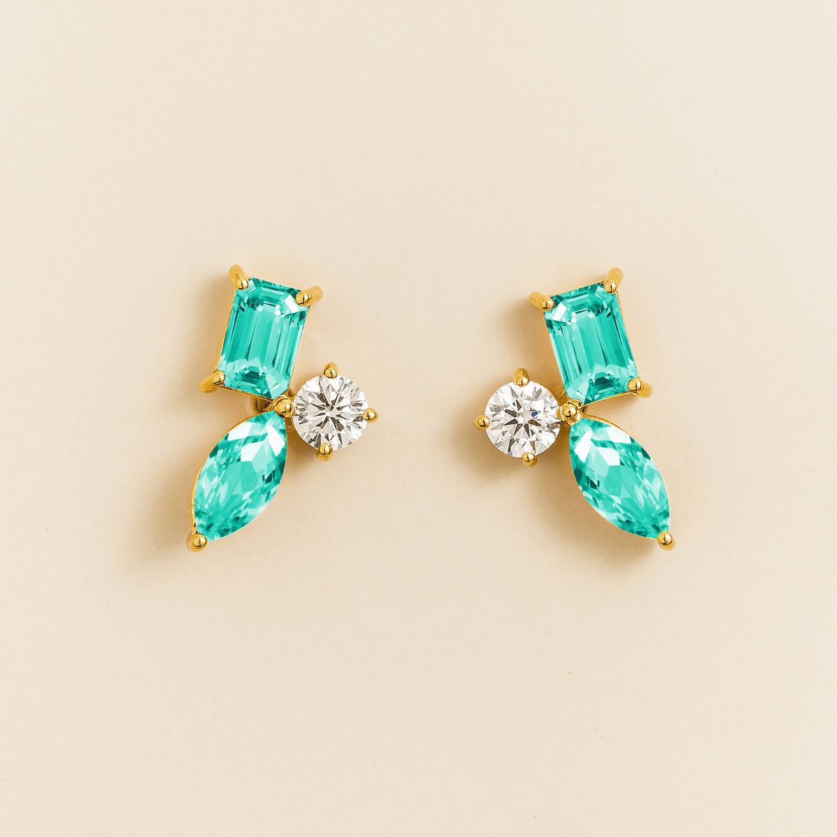Sanka Paraiba sapphire cluster stud earrings in gold: baguette and marquise lab-grown sapphires, round diamond