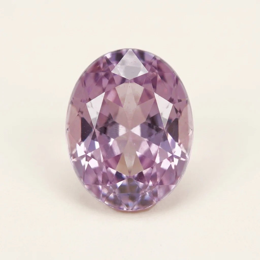 Lavender lab-grown sapphire, oval cut