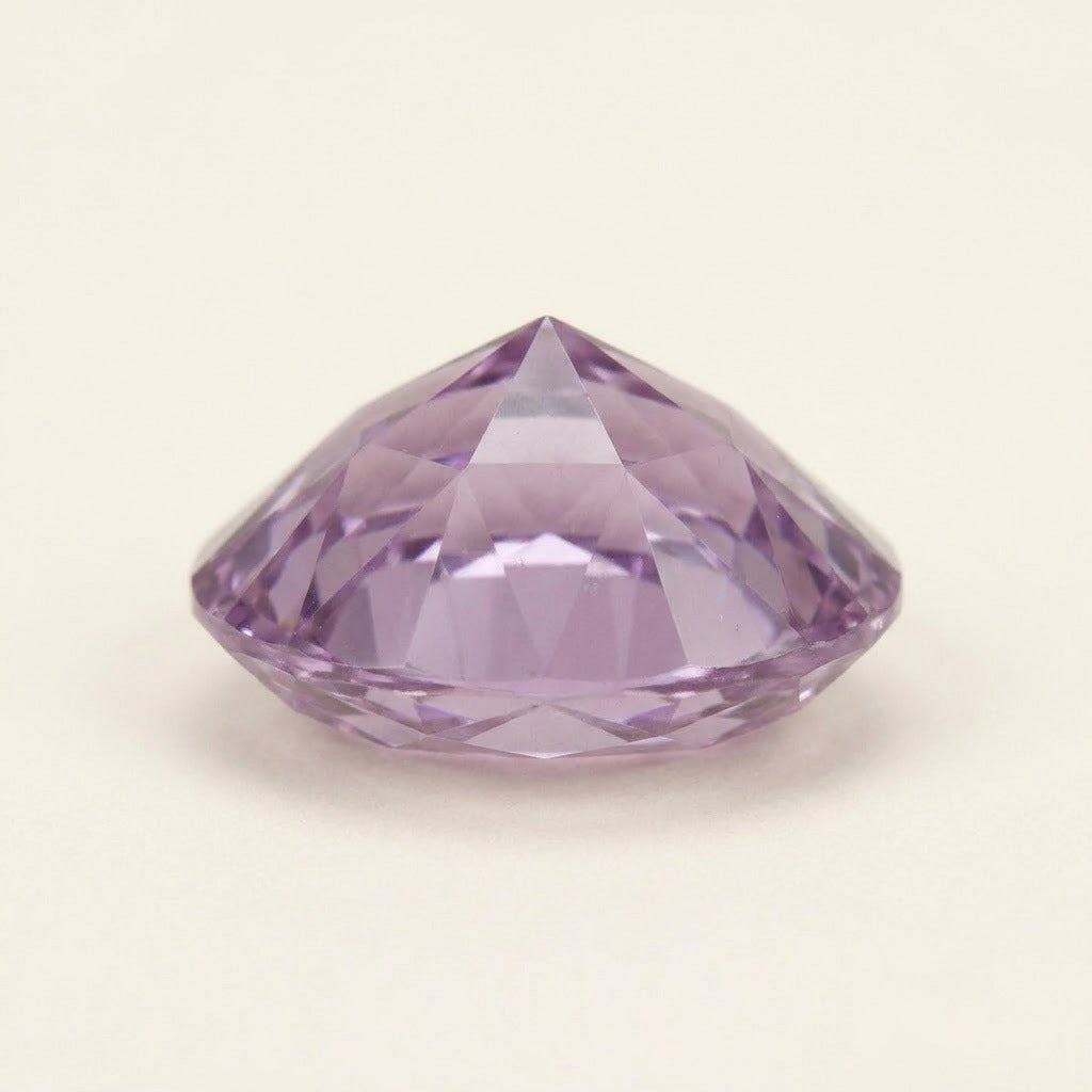 Lavender lab-grown sapphire, oval cut, side view