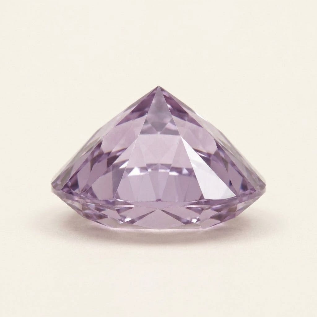 Lavender lab-grown sapphire, pear cut, side view