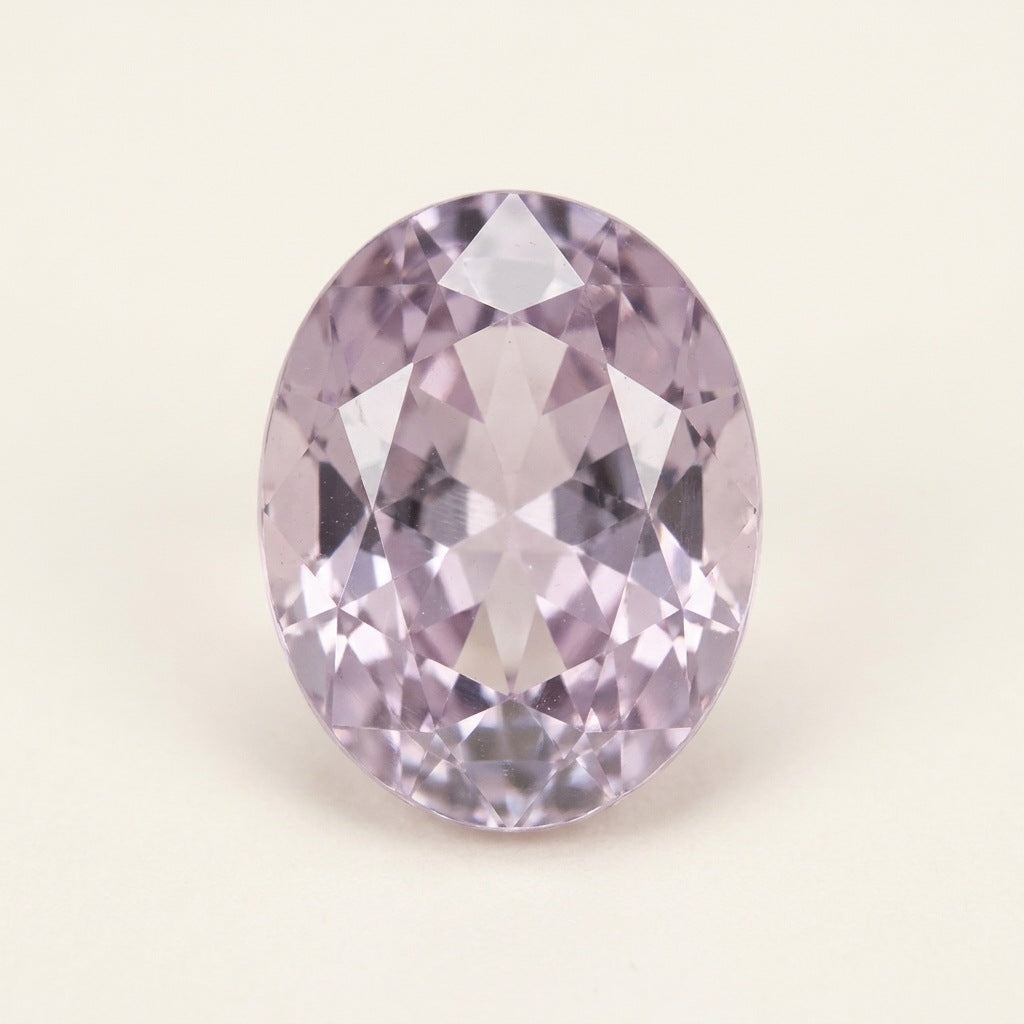 Lavender lab-grown sapphire, oval cut