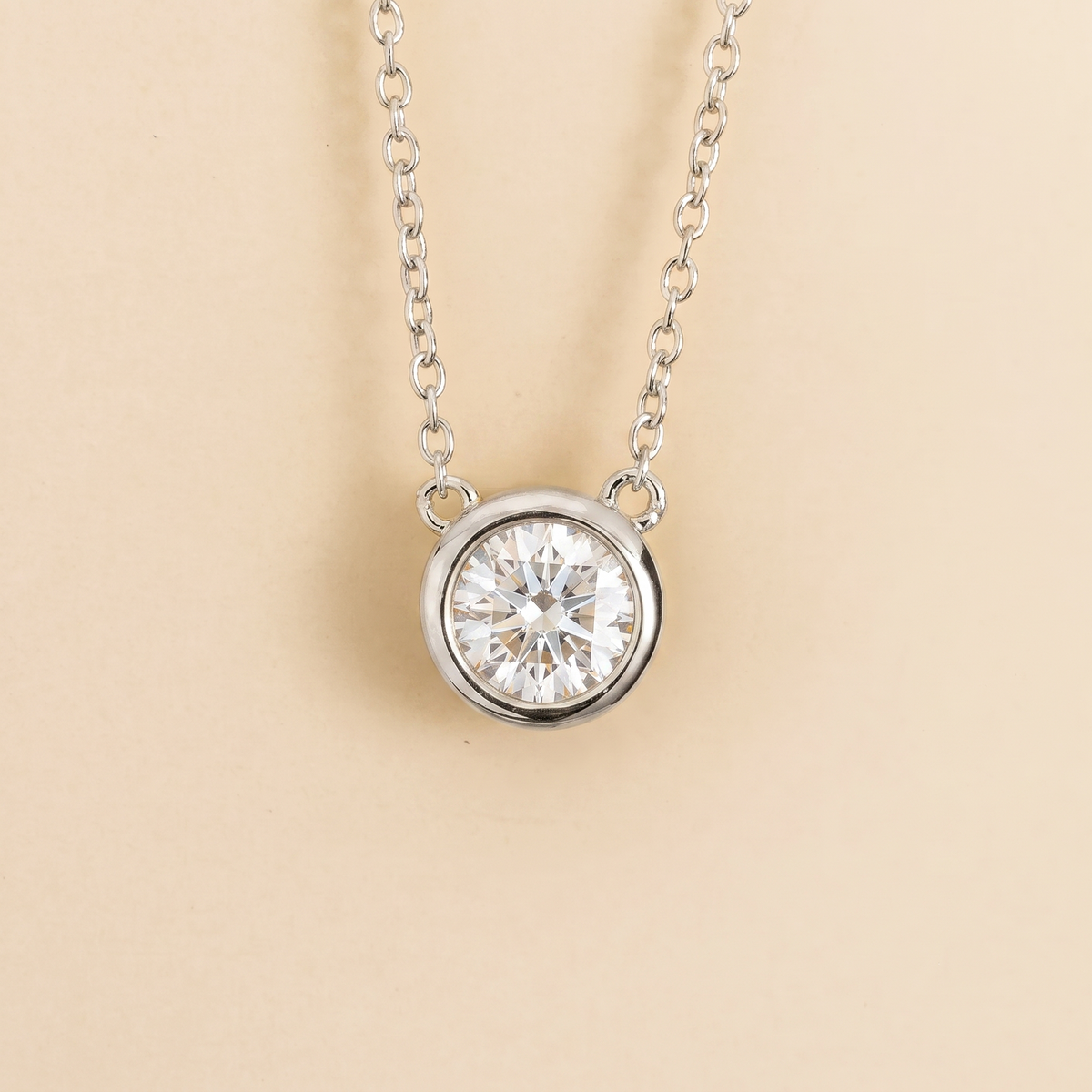 Margo Diamond Round Bezel Set Solitaire White Gold Necklace by Juvetti, bespoke jewellery London