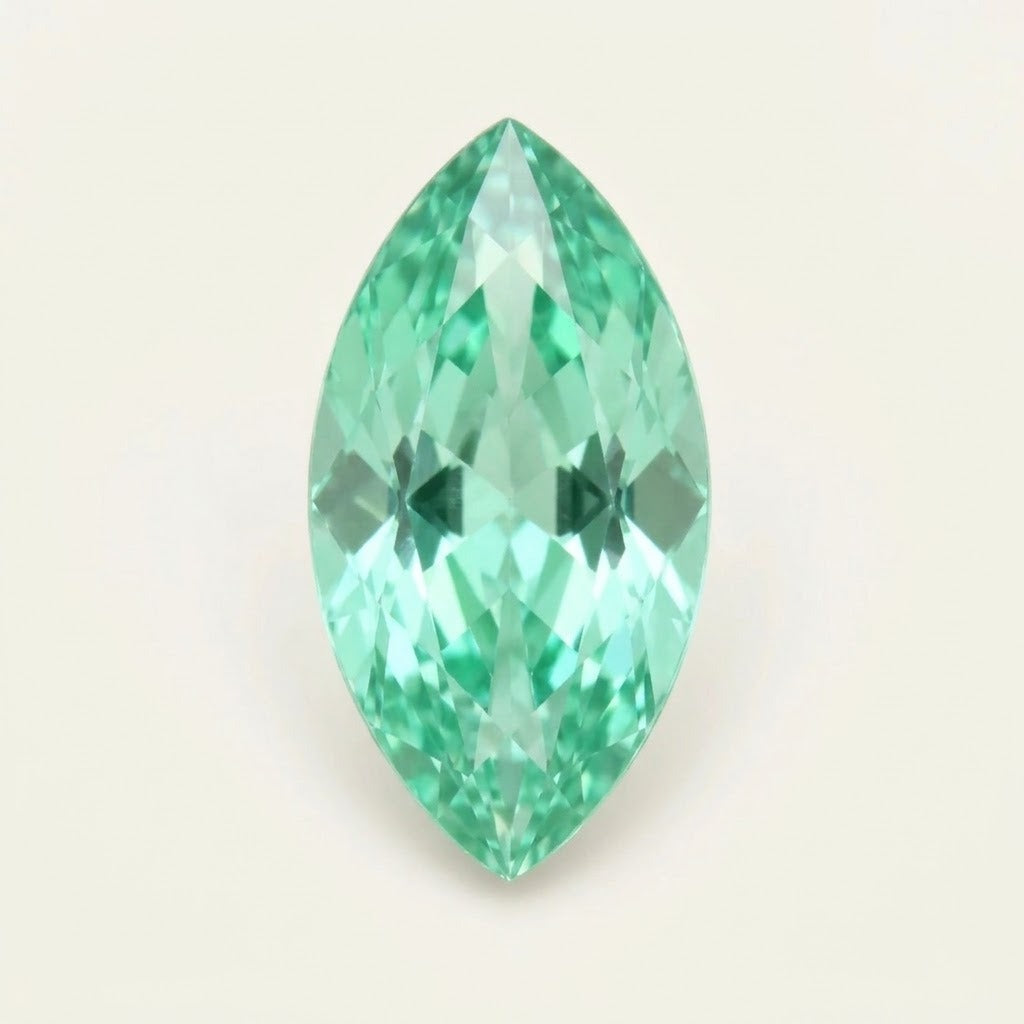 Mint green lab-grown sapphire, marquise cut