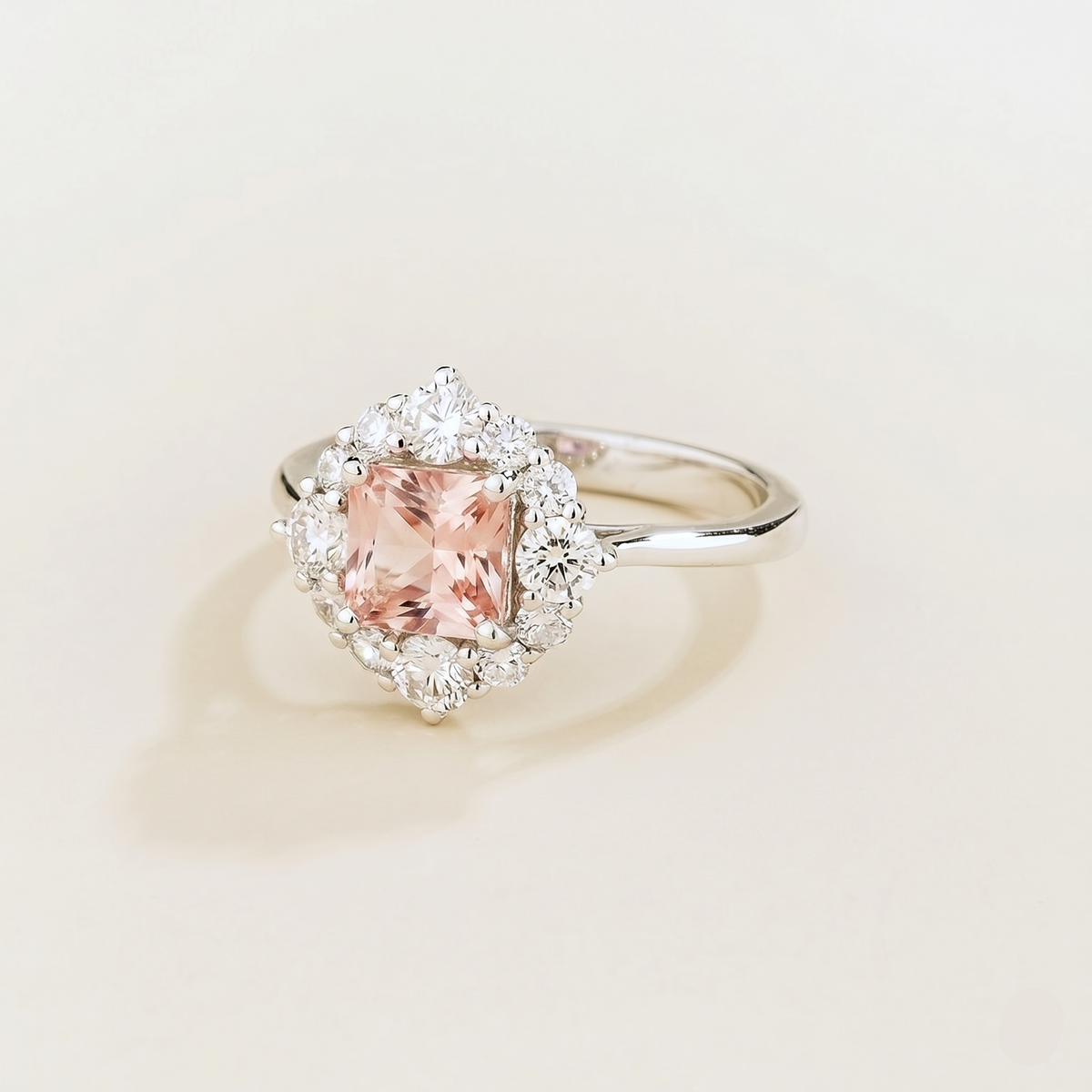 Tuli cushion-cut lab-grown morganite and diamond halo ring in white gold – angle view | Juvetti London
