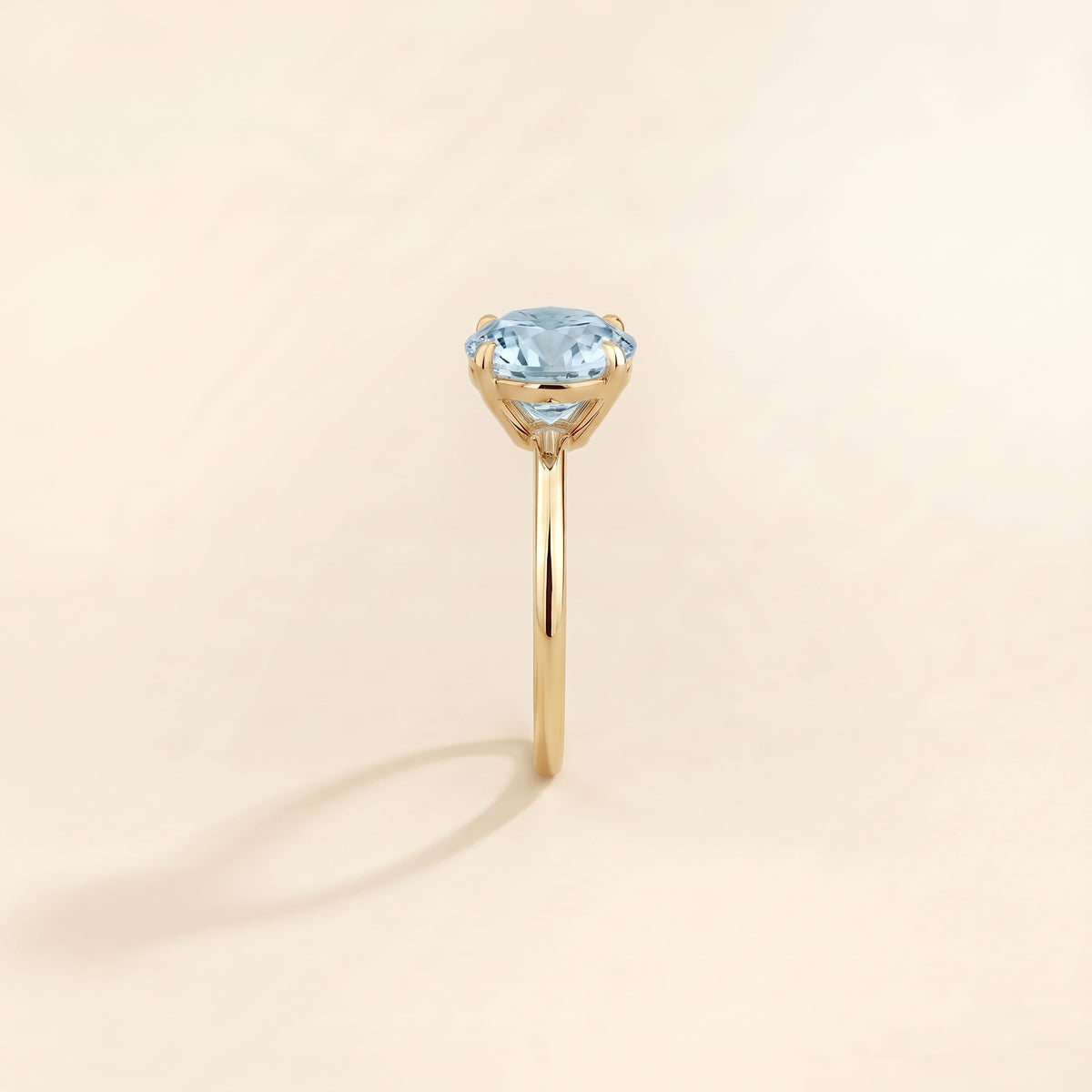 Nina Round Shape Aquamarine Cathedral Solitaire Ring in Gold, side edge view