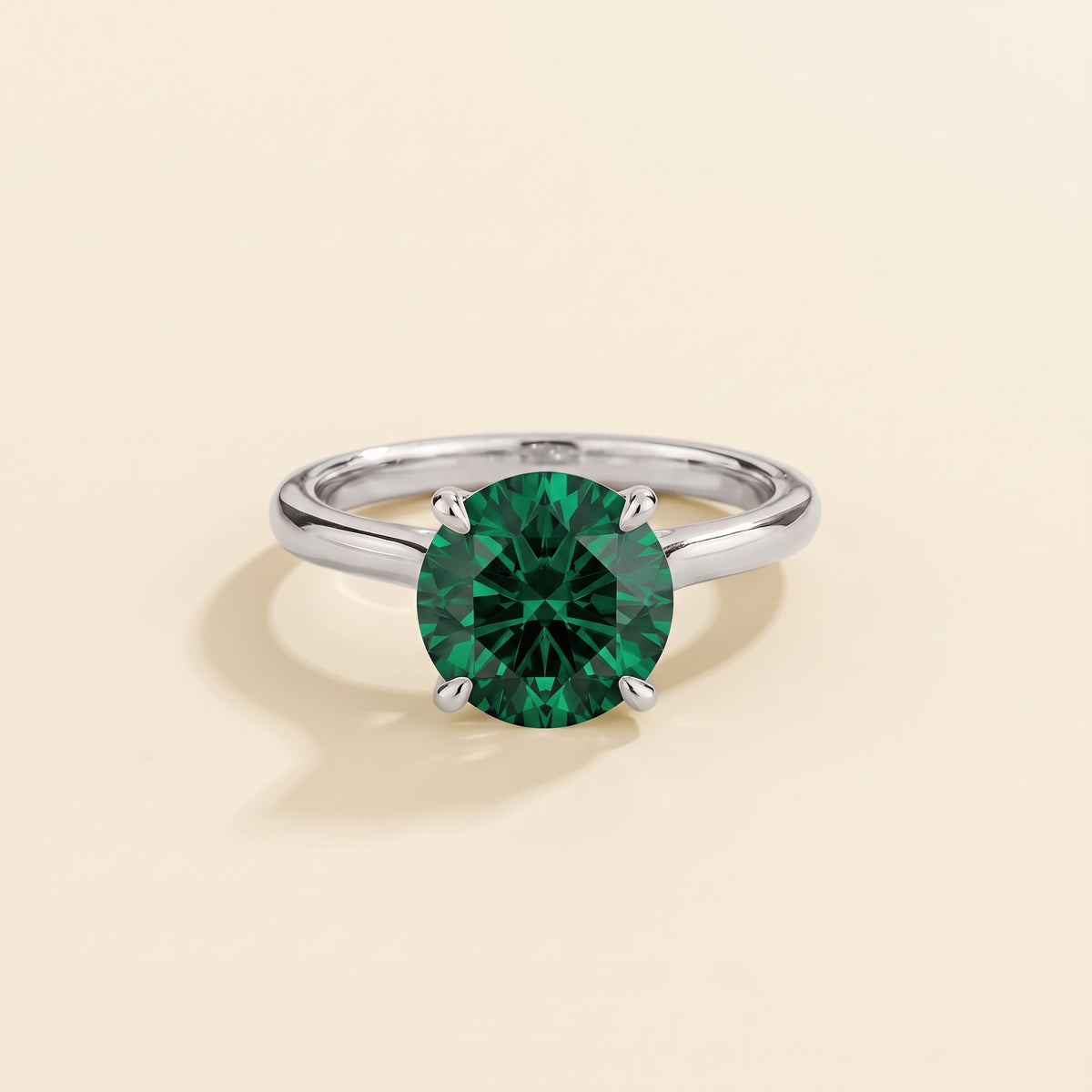 Nina Round Shape Emerald Cathedral Solitaire Ring in White Gold, front view