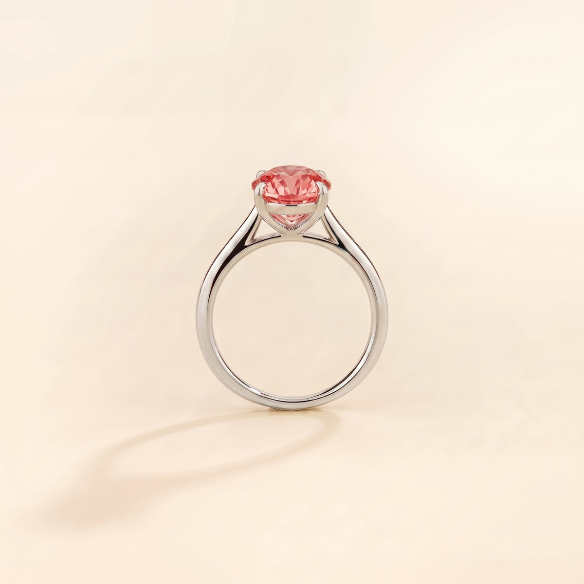 Nina Round Shape Padparadscha Sapphire Cathedral Solitaire Ring in White Gold, side profile view