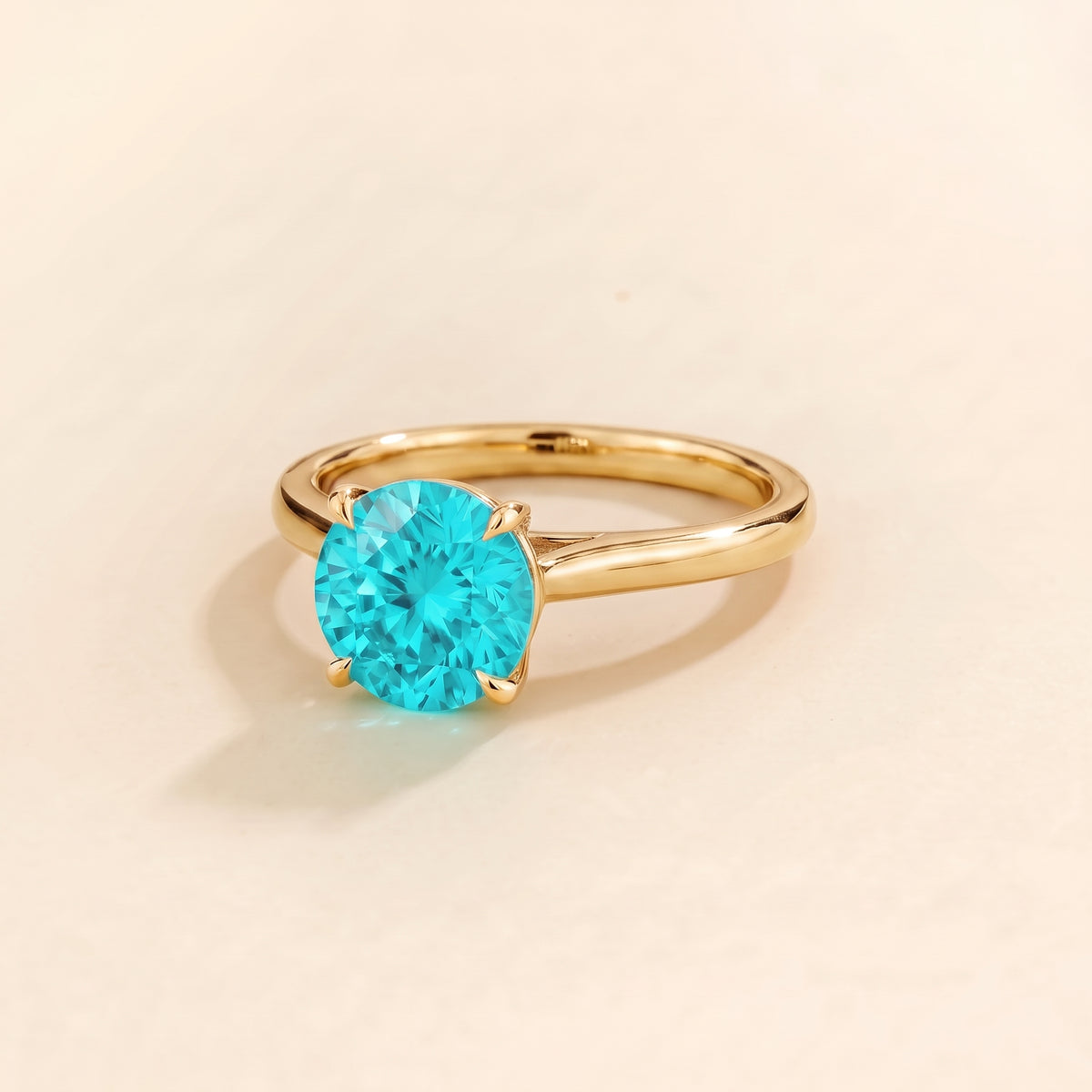 Nina Round Shape Paraiba Sapphire Cathedral Solitaire Ring in Gold, three-quarter view