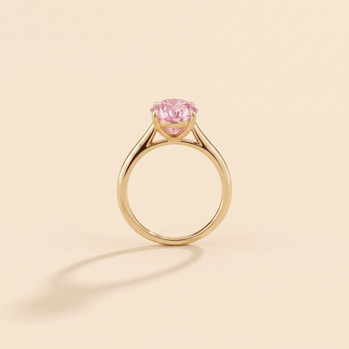 Nina Round Shape Pastel Pink Sapphire Cathedral Solitaire Ring in Gold, side profile view