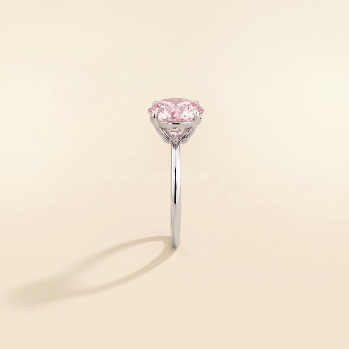 Nina Round Shape Pastel Pink Sapphire Cathedral Solitaire Ring in White Gold, side edge view