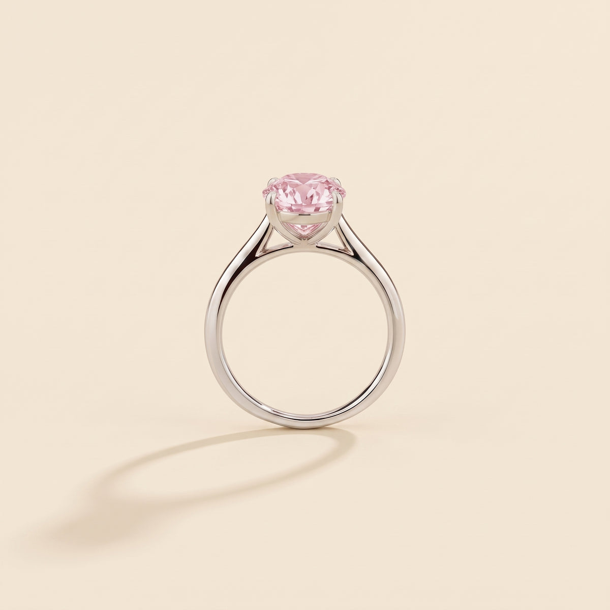 Nina Round Shape Pastel Pink Sapphire Cathedral Solitaire Ring in White Gold, side profile view