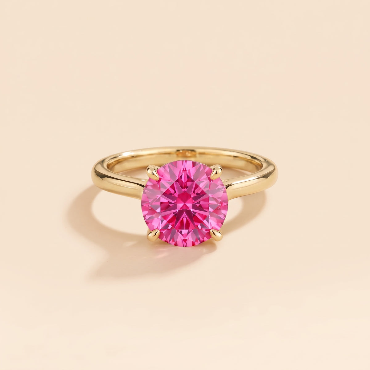Nina Round Shape Vivid Pink Sapphire Cathedral Solitaire Ring in Gold, front view