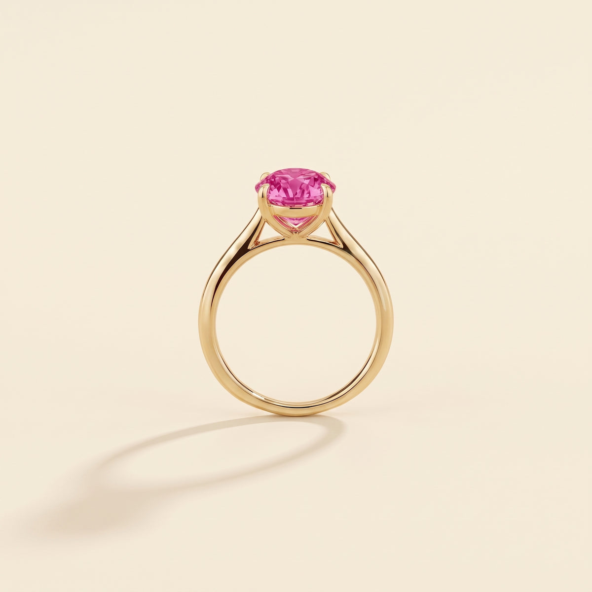 Nina Round Shape Vivid Pink Sapphire Cathedral Solitaire Ring in Gold, side profile view