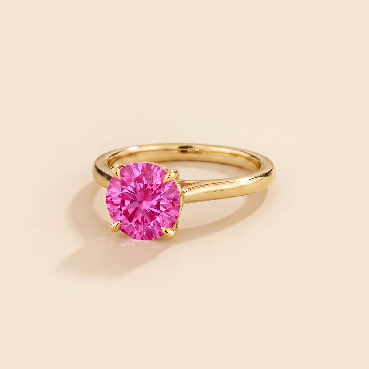 Nina Round Shape Vivid Pink Sapphire Cathedral Solitaire Ring in Gold, three-quarter view