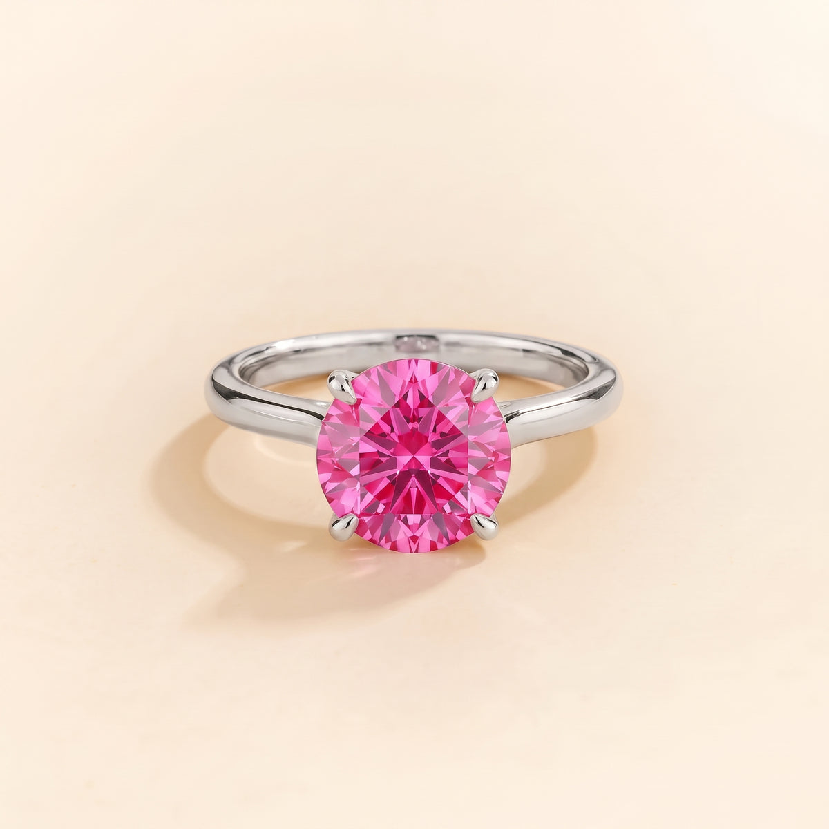 Nina Round Shape Vivid Pink Sapphire Cathedral Solitaire Ring in White Gold, front view