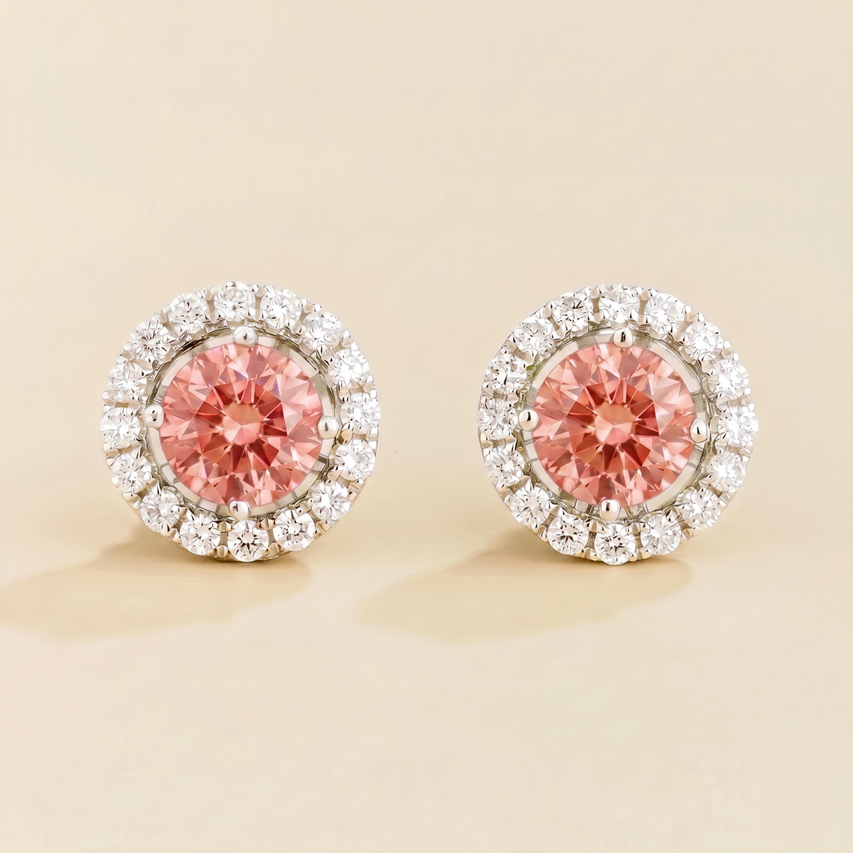 Floret round lab-grown padparadscha sapphire and diamond halo stud earrings in white gold – front | Juvetti London