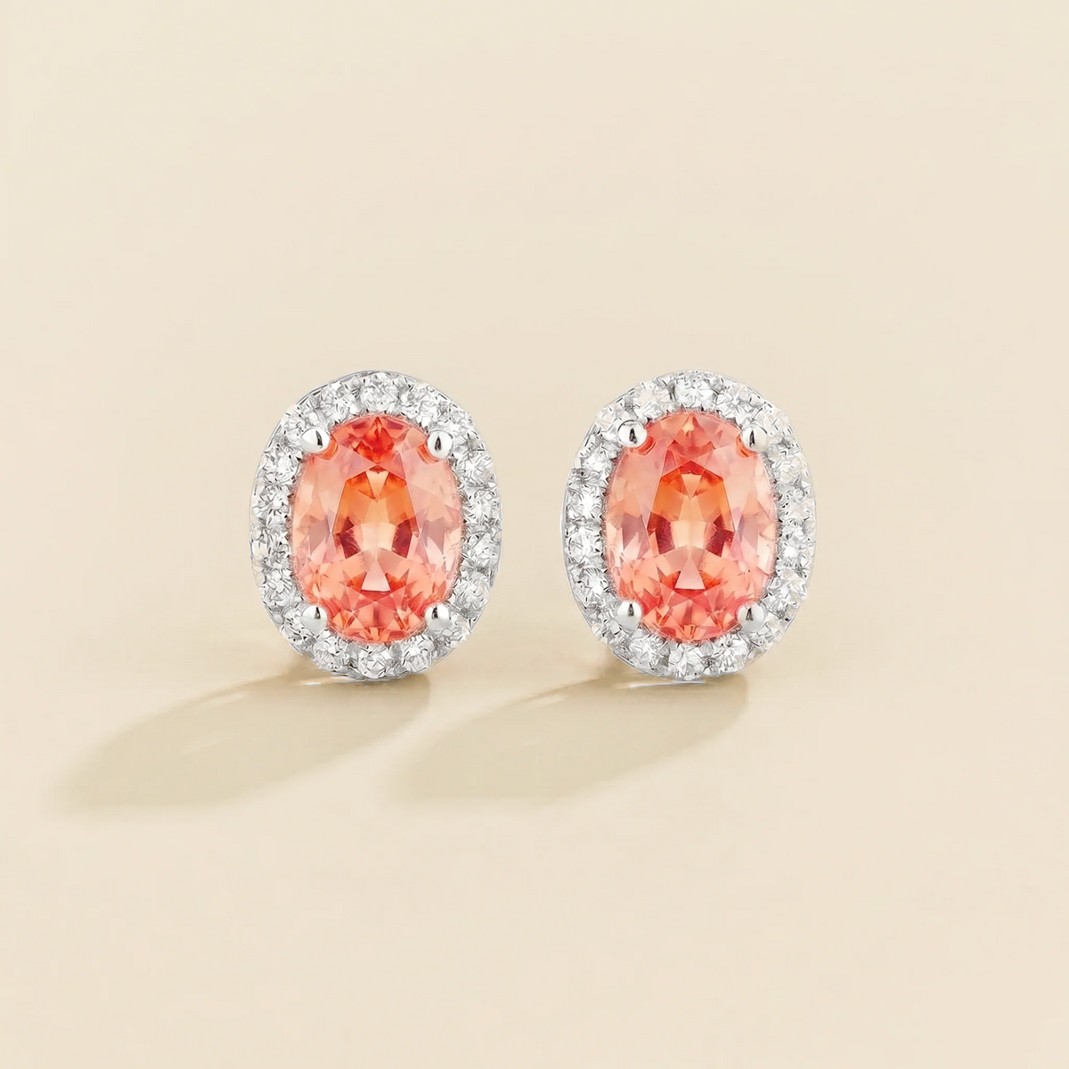 Lab-grown padparadscha sapphire and diamond oval halo stud earrings in white gold – front view | Mina by Juvetti