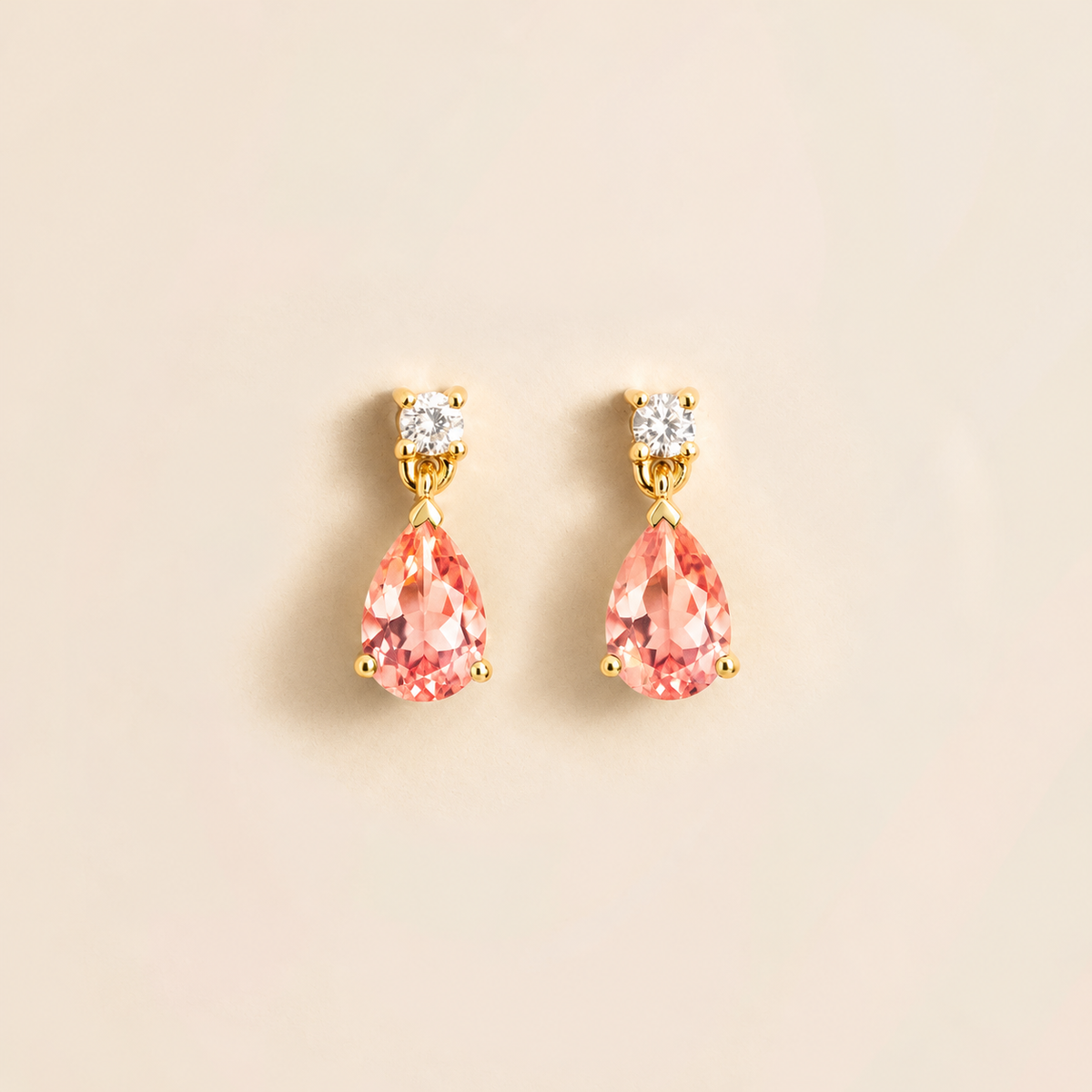 Lab-grown padparadscha sapphire and diamond pear drop earrings in gold – front view | Pisa by Juvetti