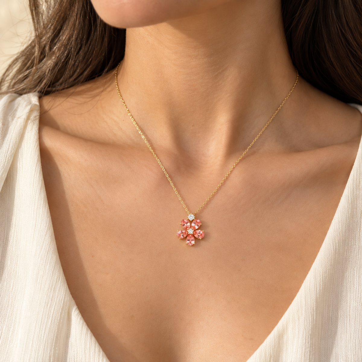 Model wears the Florea Padparadscha Sapphire & Diamond Flower Pendant Necklace in Gold