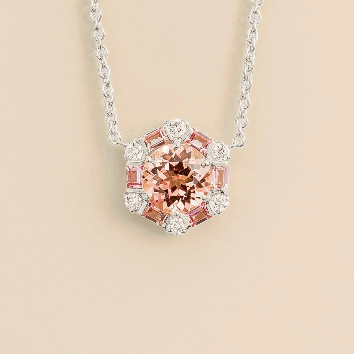 Melba padparadscha sapphire, pink sapphire & diamond halo hexagon pendant necklace in white gold