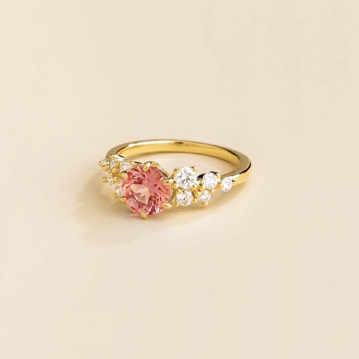 Floret round lab-grown padparadscha sapphire and diamond cluster ring in gold – side | Juvetti London