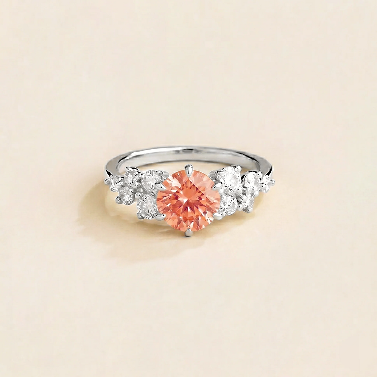 Floret round lab-grown padparadscha sapphire and diamond cluster ring in white gold – front | Juvetti London