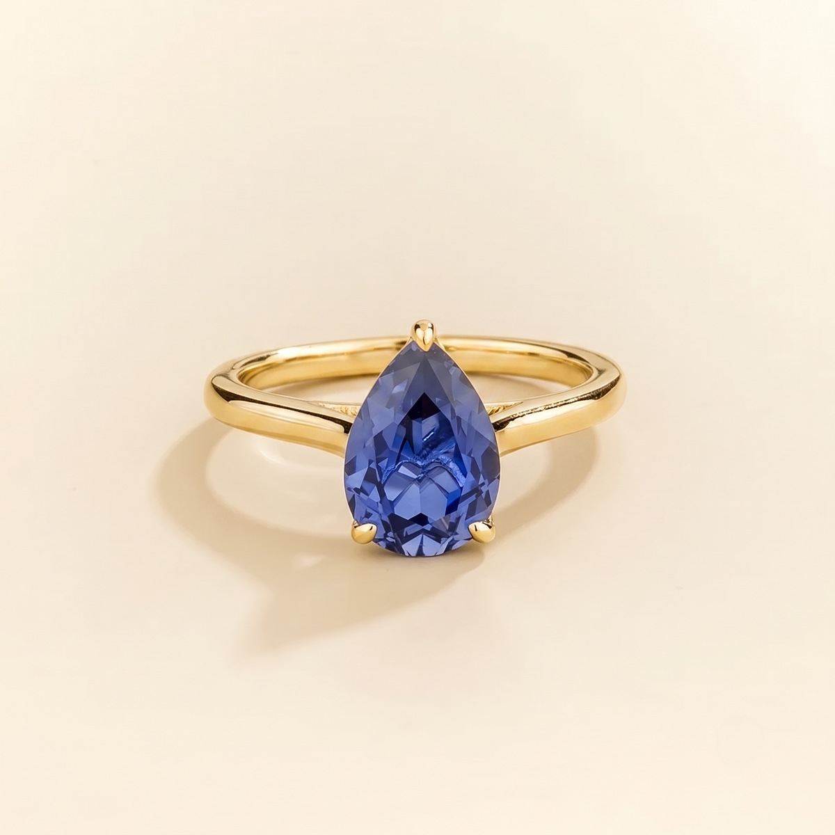 Pandal Pear Shape Blue Sapphire  Cathedral Solitaire Ring front