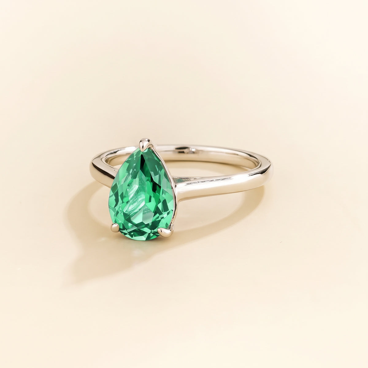 Pandal Pear Shape Green Sapphire Cathedral Solitaire Ring in White Gold, three-quarter view