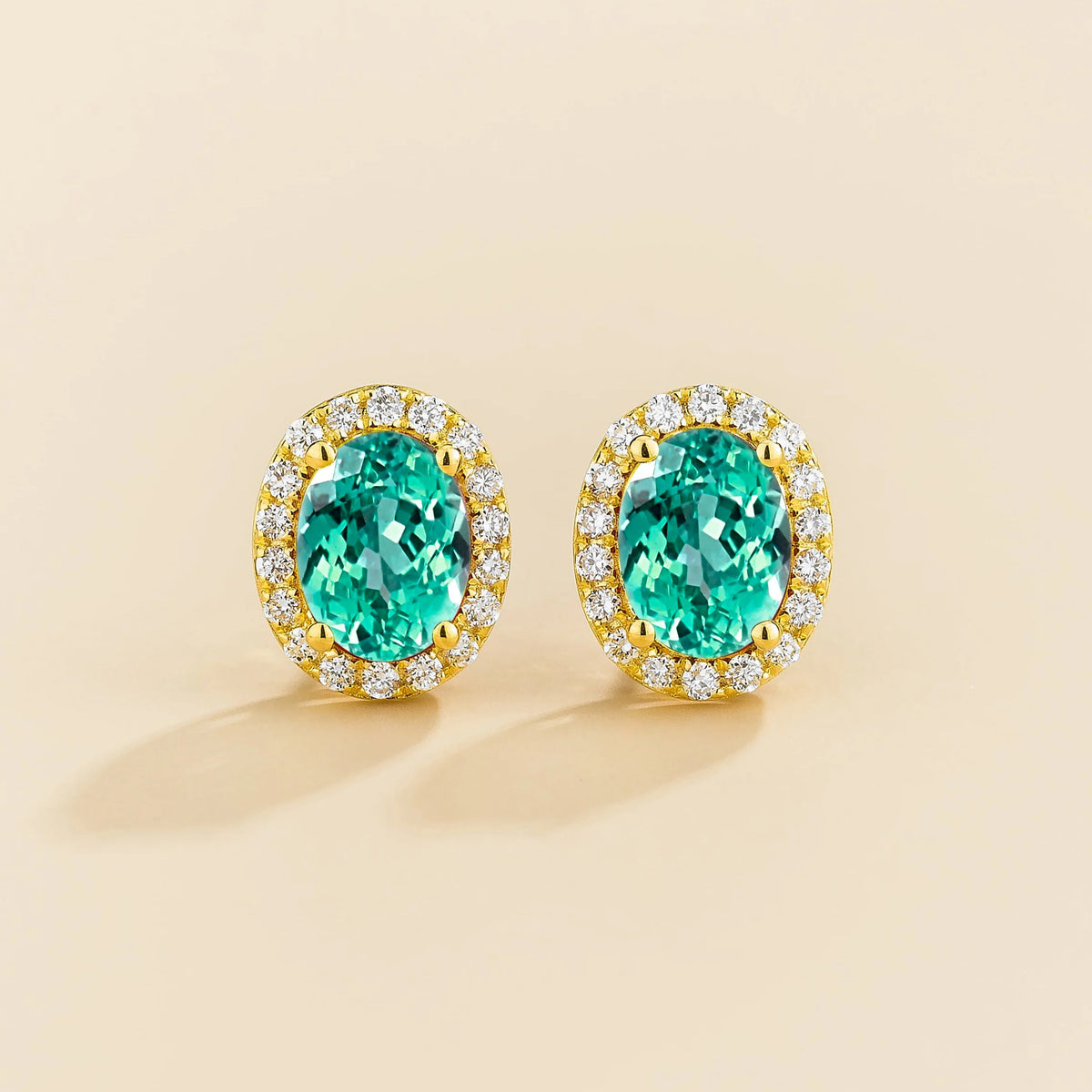 Lab-grown Paraiba sapphire and diamond oval halo stud earrings in gold – front view | Mina by Juvetti