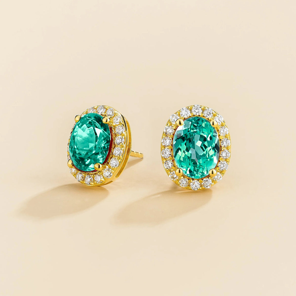Lab-grown Paraiba sapphire and diamond oval halo stud earrings in gold – side view | Mina by Juvetti