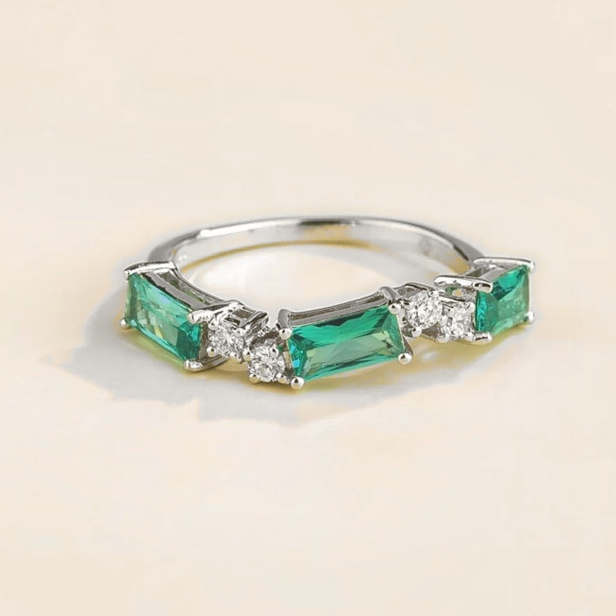 Forma paraiba sapphire & diamond baguette three-stone ring in white gold
