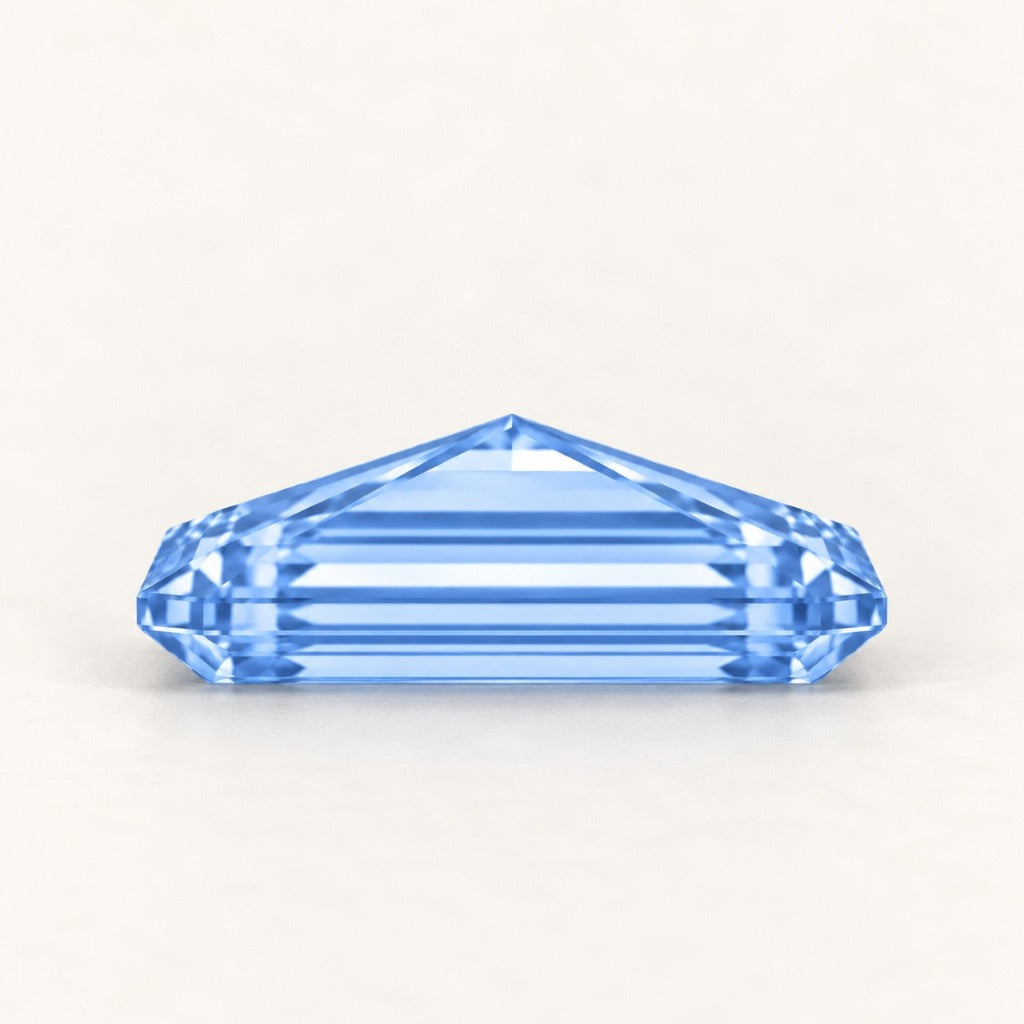 Pastel blue lab-grown sapphire, baguette cut, side view