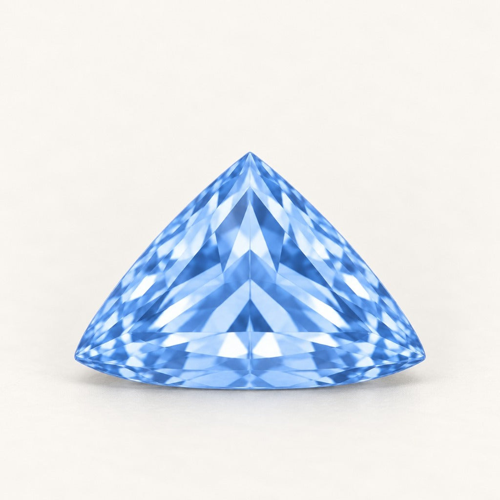 Pastel blue lab-grown sapphire, trillion cut, side view