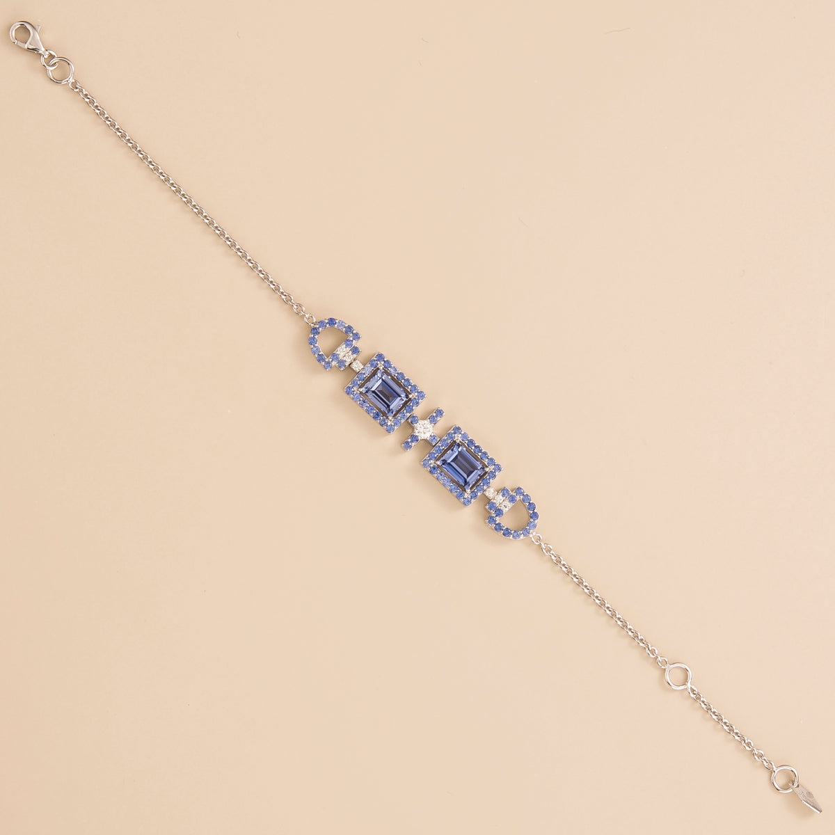 Ciceris pastel blue sapphire Art Deco halo bracelet in white gold, two emerald-cut lab-grown sapphires with diamonds, full length | Juvetti London