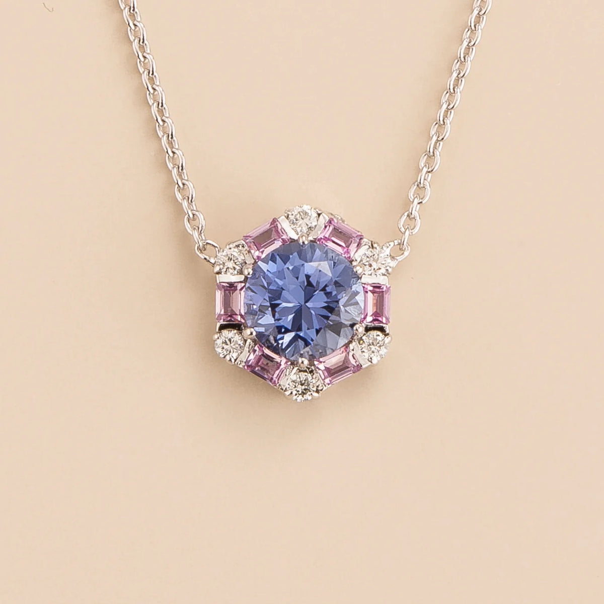 Melba hexagon necklace in 18K white gold vermeil set with lab grown pastel blue sapphire, Pink sapphire and Diamond gem stones.