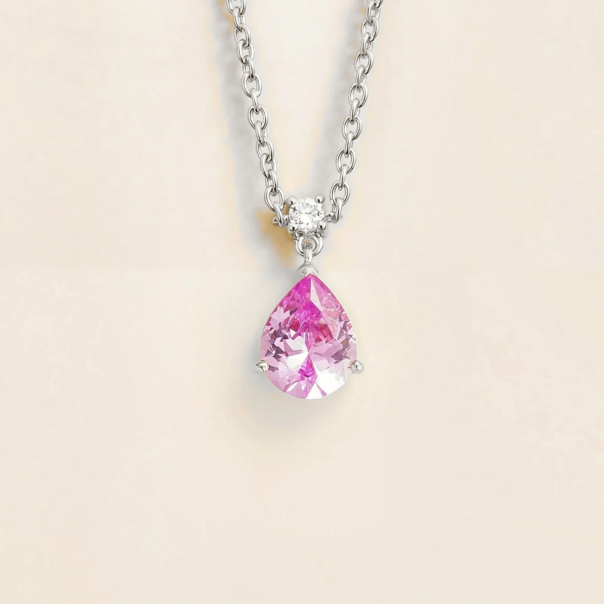 Lab-grown pastel pink sapphire and diamond pear drop pendant necklace in white gold, medium – front view | Pisa by Juvetti