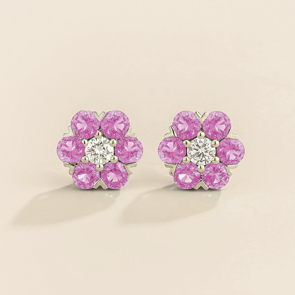 Image of Juvetti's Cinq earrings in white gold set with pink sapphires and diamond.