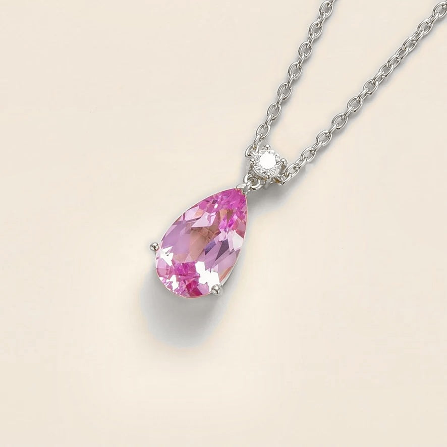 Lab-grown pink sapphire and diamond pear drop pendant necklace in white gold, large – angled view | Pisa by Juvetti