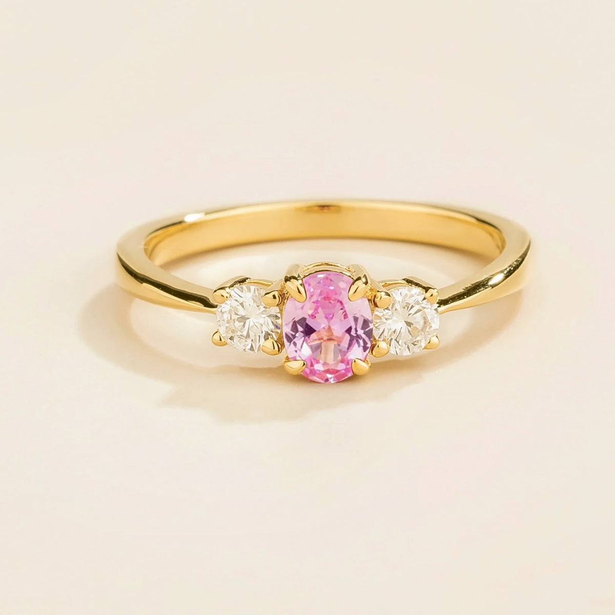 Boble pink sapphire oval & diamond three-stone ring in gold
