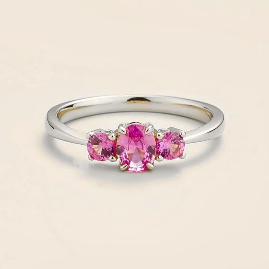 Boble pink sapphire oval three-stone ring in white gold