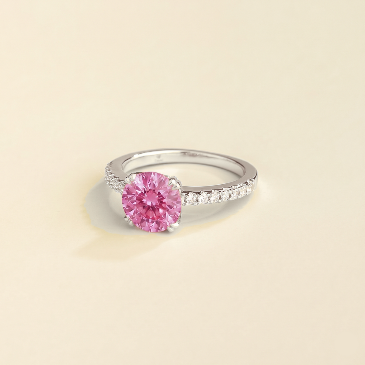 Como round lab-grown pink sapphire solitaire pavé ring in white gold – angle | Juvetti London