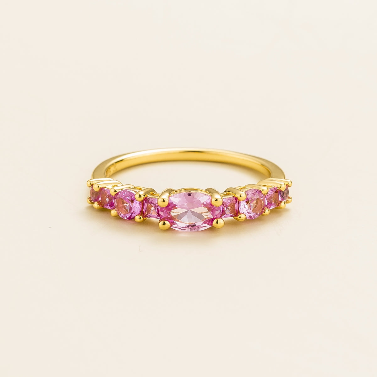 Petra Pink Sapphire Graduated Band Ring in Gold | Juvetti