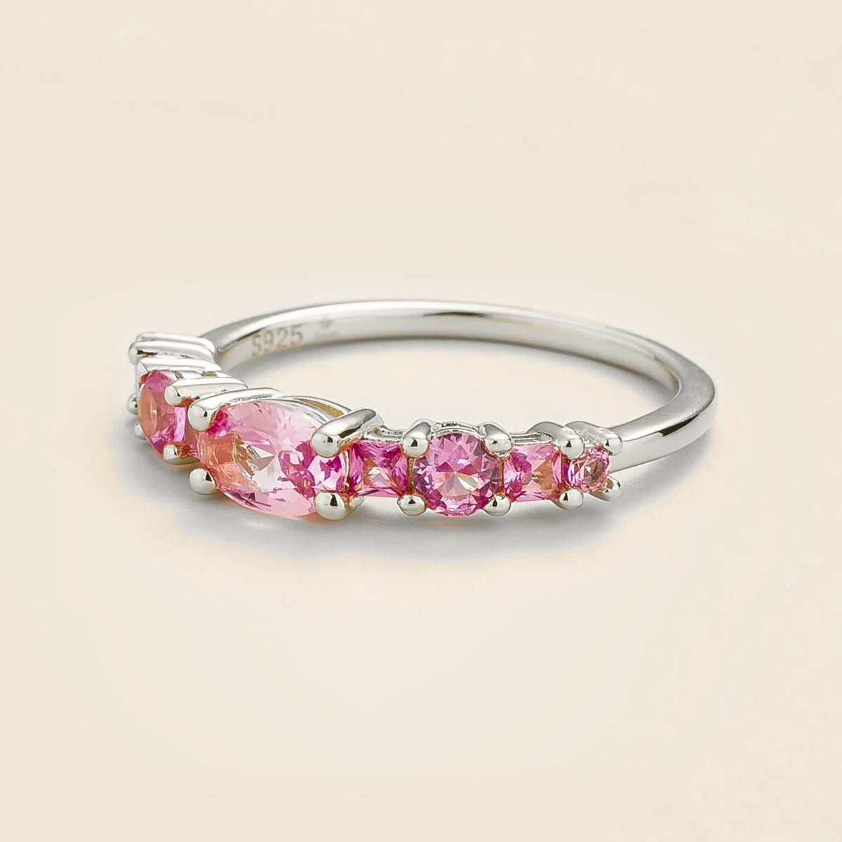 Petra Pink Sapphire Graduated Band Ring in White Gold – angle view