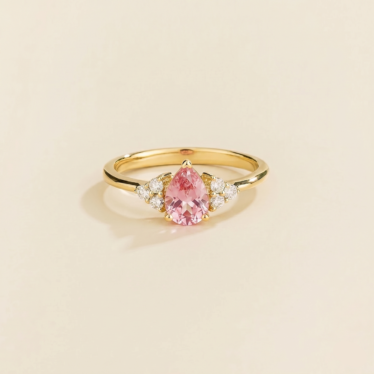 Pear-cut lab-grown pink sapphire and diamond ring in gold – front view | Pisa by Juvetti